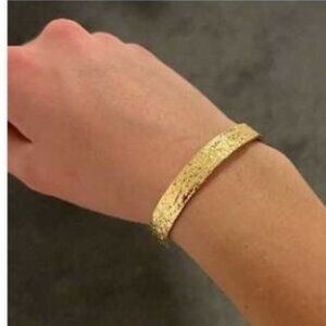 NWT gold embossed Stainless Steel plated gold cuff bracelet